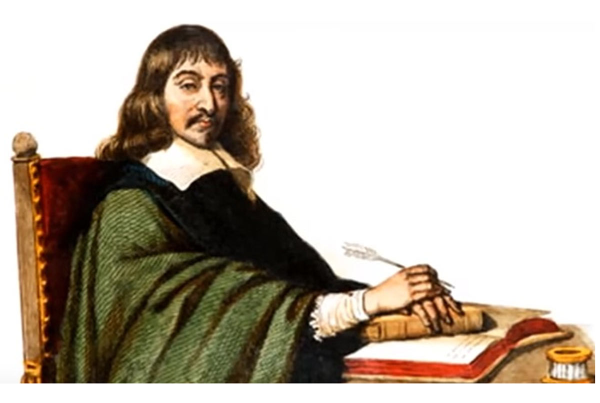 رنه دکارت پشت میز در حال نوشتن